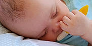 Skylar is registered to the contest to win money with this photo: baby, bodypart, brush, device, eating, face, finger, food, fruit, hand, head, newborn, person, photography, plant, portrait, produce, sleeping, tool, toothbrush