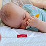 Skylar is registered to the contest to win money with this photo: baby, bed, blanket, bodypart, brush, cradle, crib, device, face, finger, furniture, hand, head, infantbed, newborn, person, photography, sleeping, tool, toothbrush
