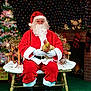 Girlfriend is registered to the contest to win money with this photo: christmas, christmas_decoration, christmas_eve, christmas_lights, christmas_ornament, christmas_tree, event, facial_hair, fictional_character, holiday, human_body, interior_design, lap, santa_claus, tradition