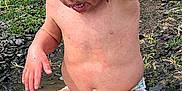 Zane joined the competition — help win amazing prizes! bare_chest, child, diaper, dirt, expression, fun, grass, messy, muddy, nature, outdoor, playful, puddle, rocks, skin, splash, summer, toddler, water, wet