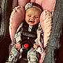 baby, car_seat, pajamas, pink, headband, smiling, pacifier, infant, clothing, happy, child, seatbelt, comfort, cute, indoors, closeup, fabric, toy, safety, person