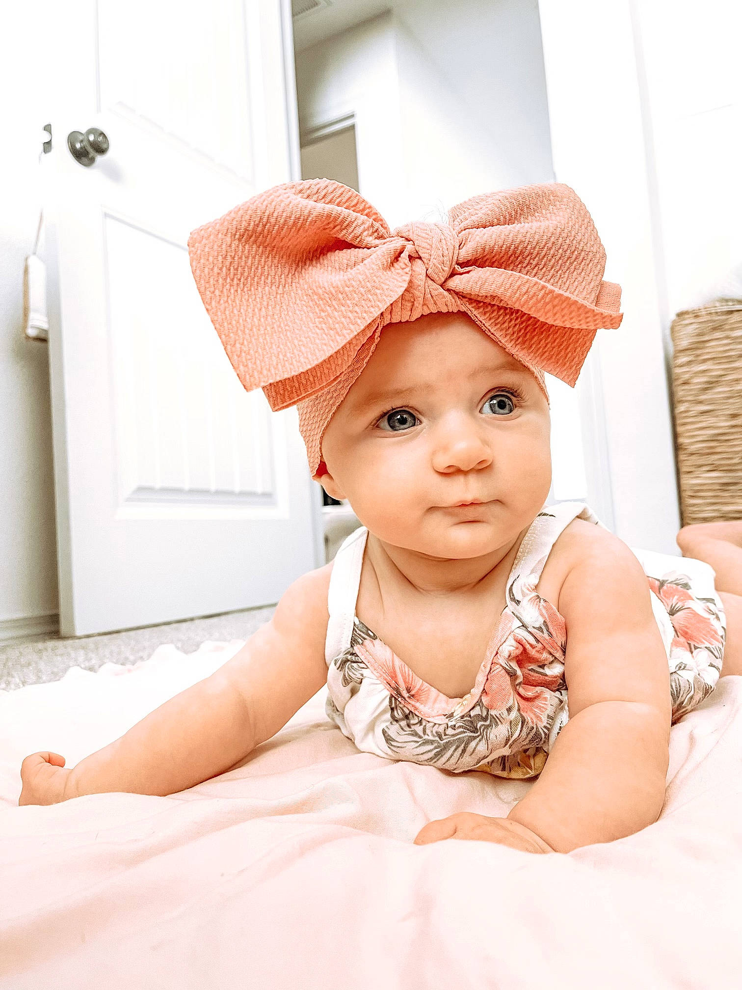 Madison joined the competition — help win amazing prizes! baby, baby_toddler_clothing, cap, door, flash_photography, flooring, hair_accessory, hairstyle, happy, headband, headgear, headpiece, headwear, lip, neck, peach, person, pink, skin, sleeve