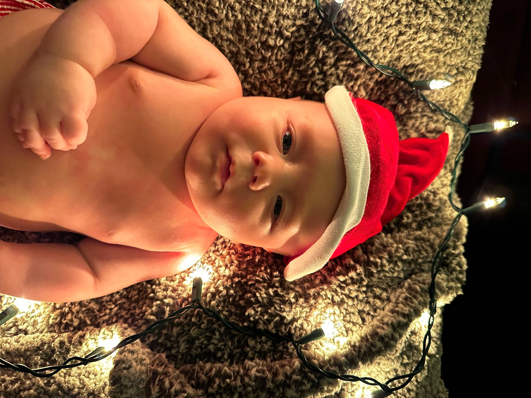 Zaxton is registered to the contest to win money with this photo: abdomen, baby, barechested, black_hair, chest, child, event, flash_photography, flesh, fun, grass, happy, headwear, human_body, leisure, lip, mouth, people_in_nature, person, toddler