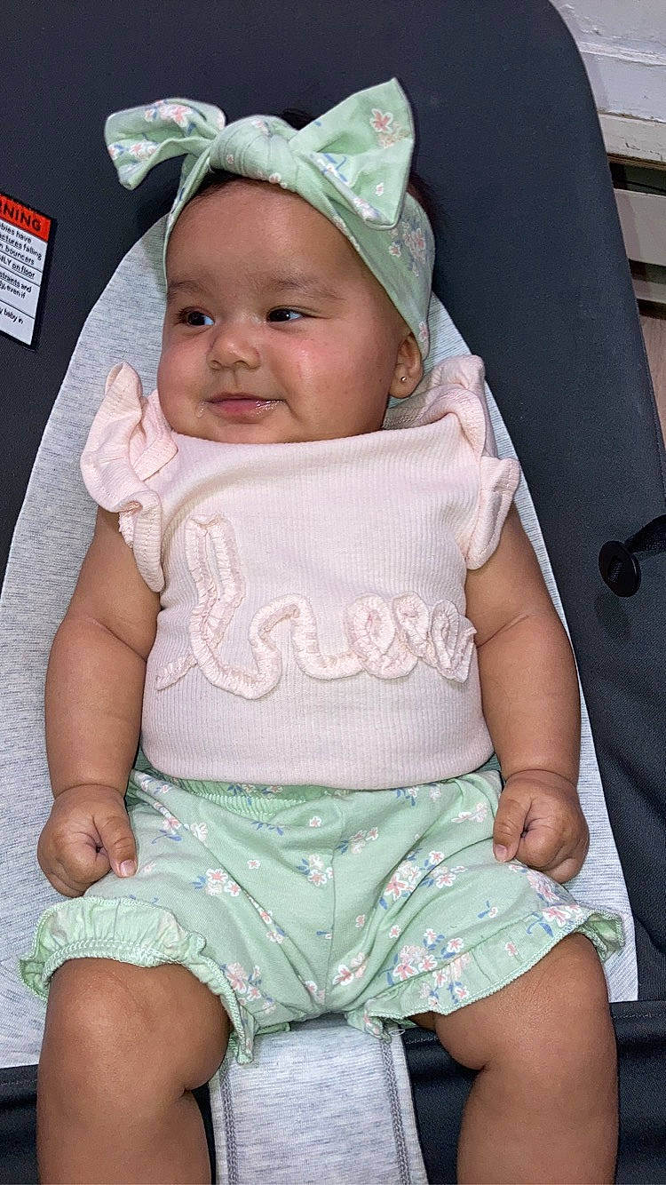 Eliani joined the competition — help win amazing prizes! baby, baby_toddler_clothing, blue, cap, cheek, eye, face, green, hand, head, headgear, headwear, joy, mouth, organ, person, pink, product, shorts, skin