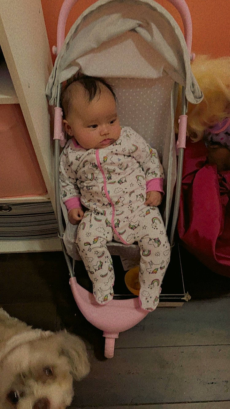 Eliani joined the competition — help win amazing prizes! arm, baby, baby_toddler_clothing, chair, clothing, comfort, hand, human_body, human_leg, knee, lap, leg, person, pink, shoe, sitting, skin, sleeve, textile, thigh