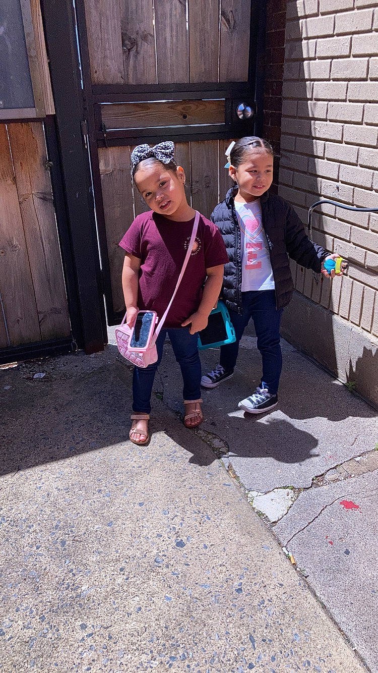 Kehlani joined the competition — help win amazing prizes! asphalt, child, door, event, eyewear, fun, happy, hat, headwear, human_leg, leisure, pedestrian, person, road, road_surface, shoe, shorts, sidewalk, sneakers, street