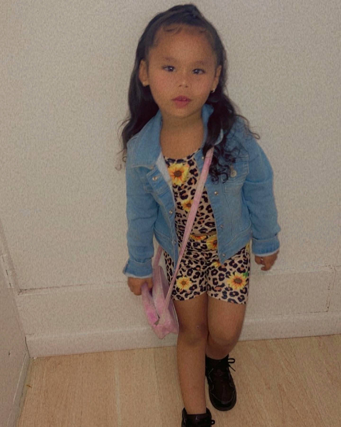 Leliani joined the competition — help win amazing prizes! blazer, brown_hair, collar, denim, dress_shirt, electric_blue, face, fashion_design, hair, human_leg, knee, long_hair, neck, outerwear, pattern, person, sleeve, sportswear, t_shirt, thigh