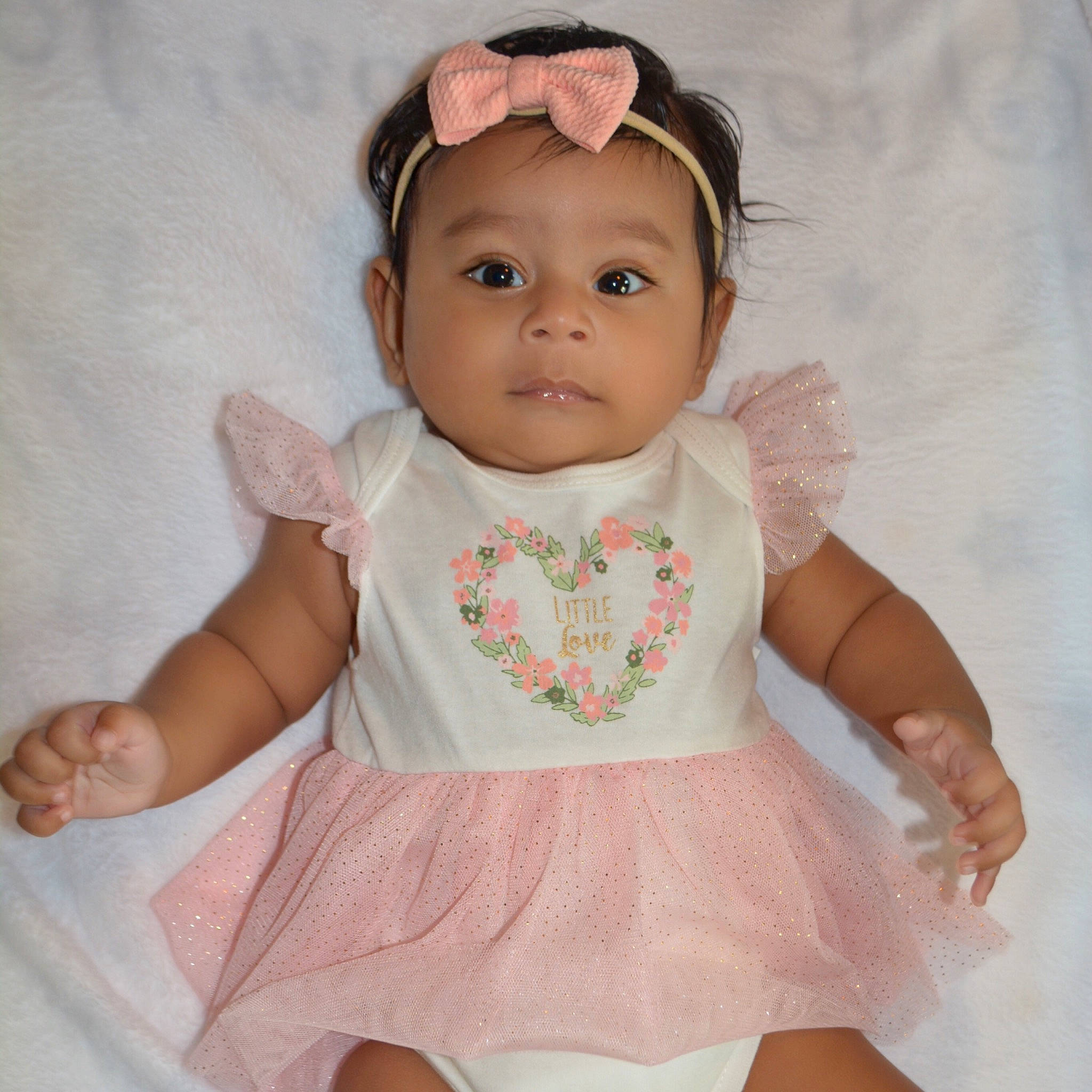 Avana joined the competition — help win amazing prizes! baby, baby_products, baby_toddler_clothing, brown_hair, cheek, child, clothing, doll, dress, hair_accessory, head, headband, iris, pattern, person, pink, product, skin, sleeve, toddler