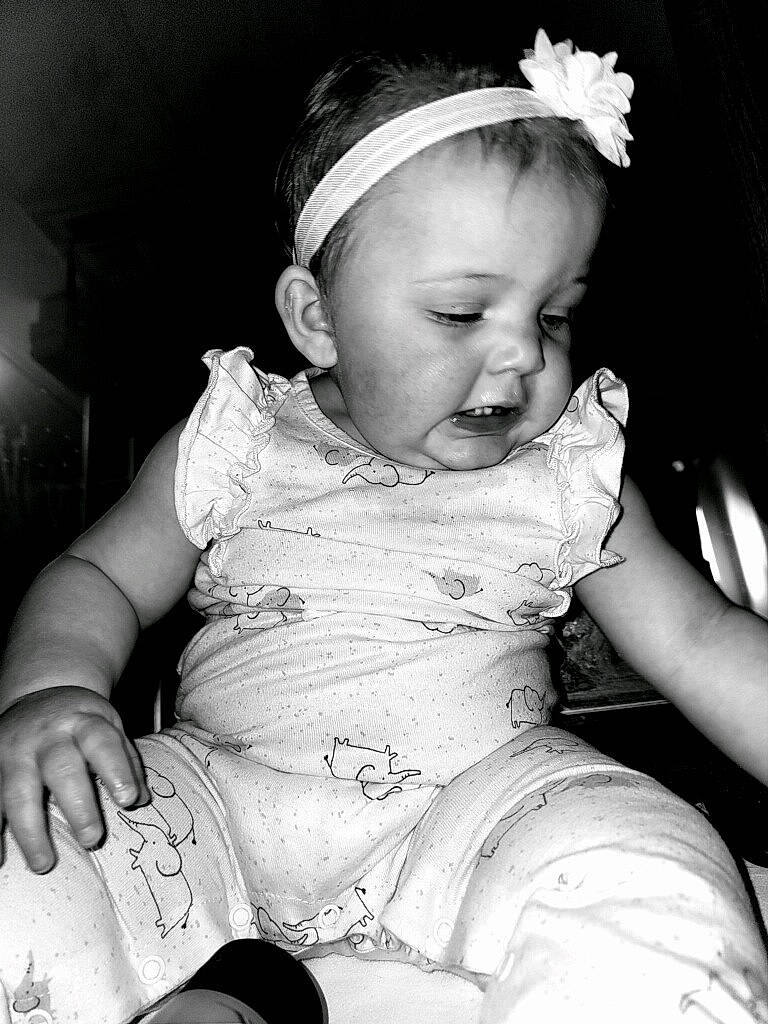 Zara joined the competition — help win amazing prizes! baby, baby_toddler_clothing, black, black_and_white, cheek, dress, finger, flash_photography, gesture, hairstyle, happy, head, iris, lip, mouth, person, skin, standing, style, toddler