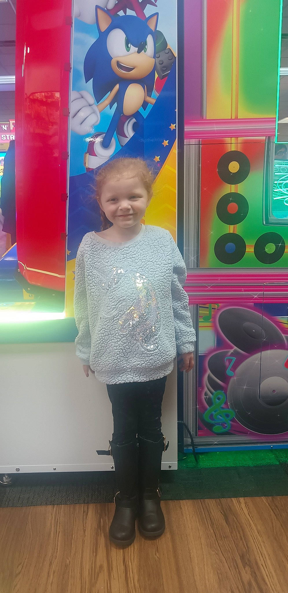 Starla joined the competition — help win amazing prizes! audio_equipment, child, electric_blue, fun, games, joy, leisure, loudspeaker, machine, magenta, person, pink, play, playground, purple, recreation, room, standing, t_shirt, toddler