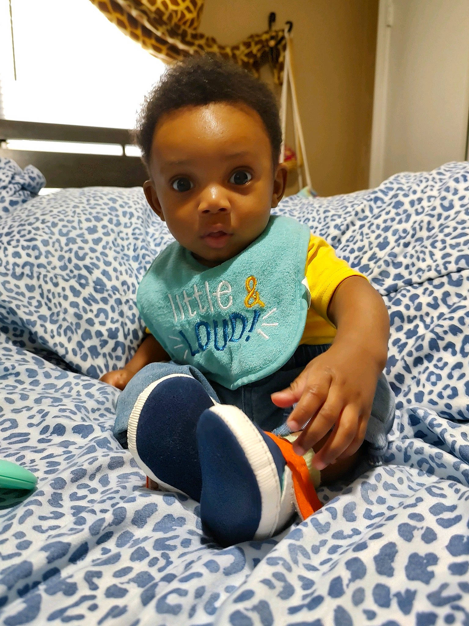 Jenesis joined the competition — help win amazing prizes! baby, baby_toddler_clothing, child, comfort, eye, fashion_accessory, floor, flooring, fun, happy, head, headpiece, human_body, jewellery, leisure, linens, person, room, sitting, t_shirt