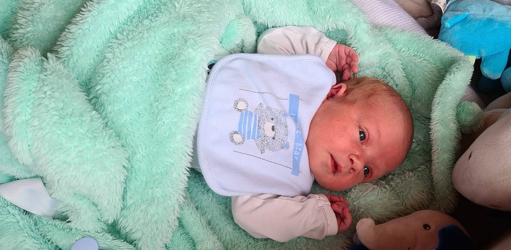 Nolan participe au concours pour gagner de l'argent avec cette photo : baby, baby_products, baby_safety, baby_sleeping, baby_toddler_clothing, bed, bedtime, cheek, child, comfort, headgear, human_body, linens, nap, person, room, skin, sleep, sleeve, textile