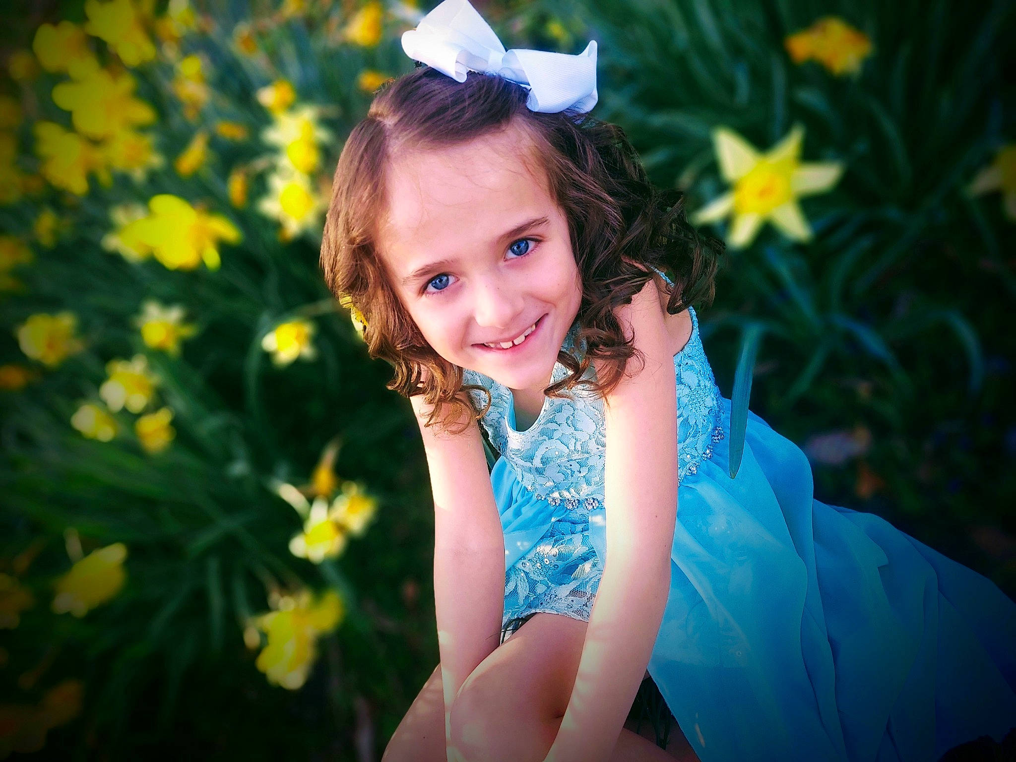 Haley is registered to the contest to win money with this photo: beauty, botany, dress, eye, facial_expression, flash_photography, flower, grass, happy, joy, leaf, light, meadow, people_in_nature, person, petal, plant, smile, summer, sunlight