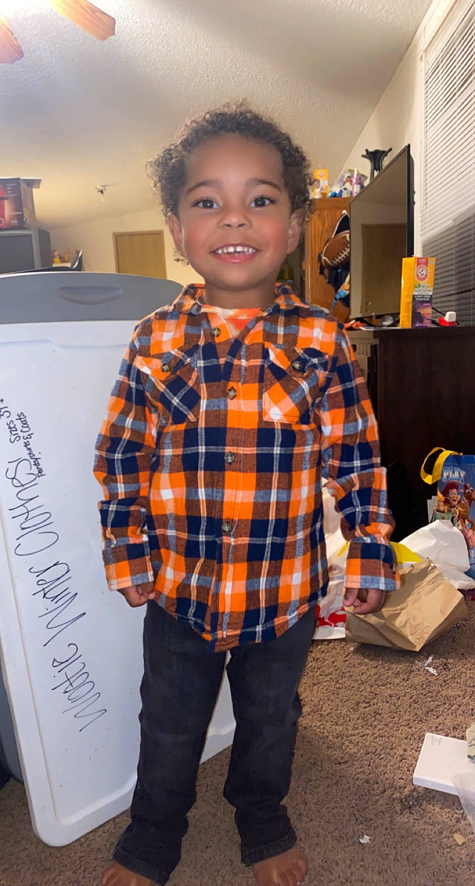 Dante joined the competition — help win amazing prizes! box, child, dress_shirt, event, fashion_design, flooring, formal_wear, fun, happy, joy, orange, pattern, person, plaid, room, smile, standing, t_shirt, tartan, toddler