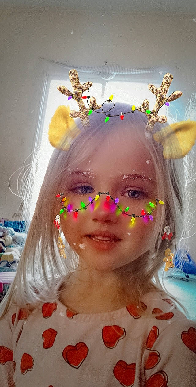 Ivory is registered to the contest to win money with this photo: art, child, chin, event, eyebrow, eyelash, eyewear, fashion_design, fun, hairstyle, happy, headpiece, lip, makeover, mouth, party_supply, person, pink, smile, vision_care