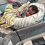 Xavier Jr is registered to the contest to win money with this photo: baby, bed, bedroom, blanket, child, comfort, cozy, curious, curly_hair, fabric, home, indoor, nap, person, pillow, resting, sleeping, soft_toys, teddy_bear, young_child