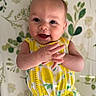 Millie joined the competition — help win amazing prizes! baby, child, smiling, clapping, yellow_clothing, lemon_pattern, floral_background, happy, cute, portrait, infant, skin, hand, face, eyes, cheeks, sleeveless, person, indoors, bright