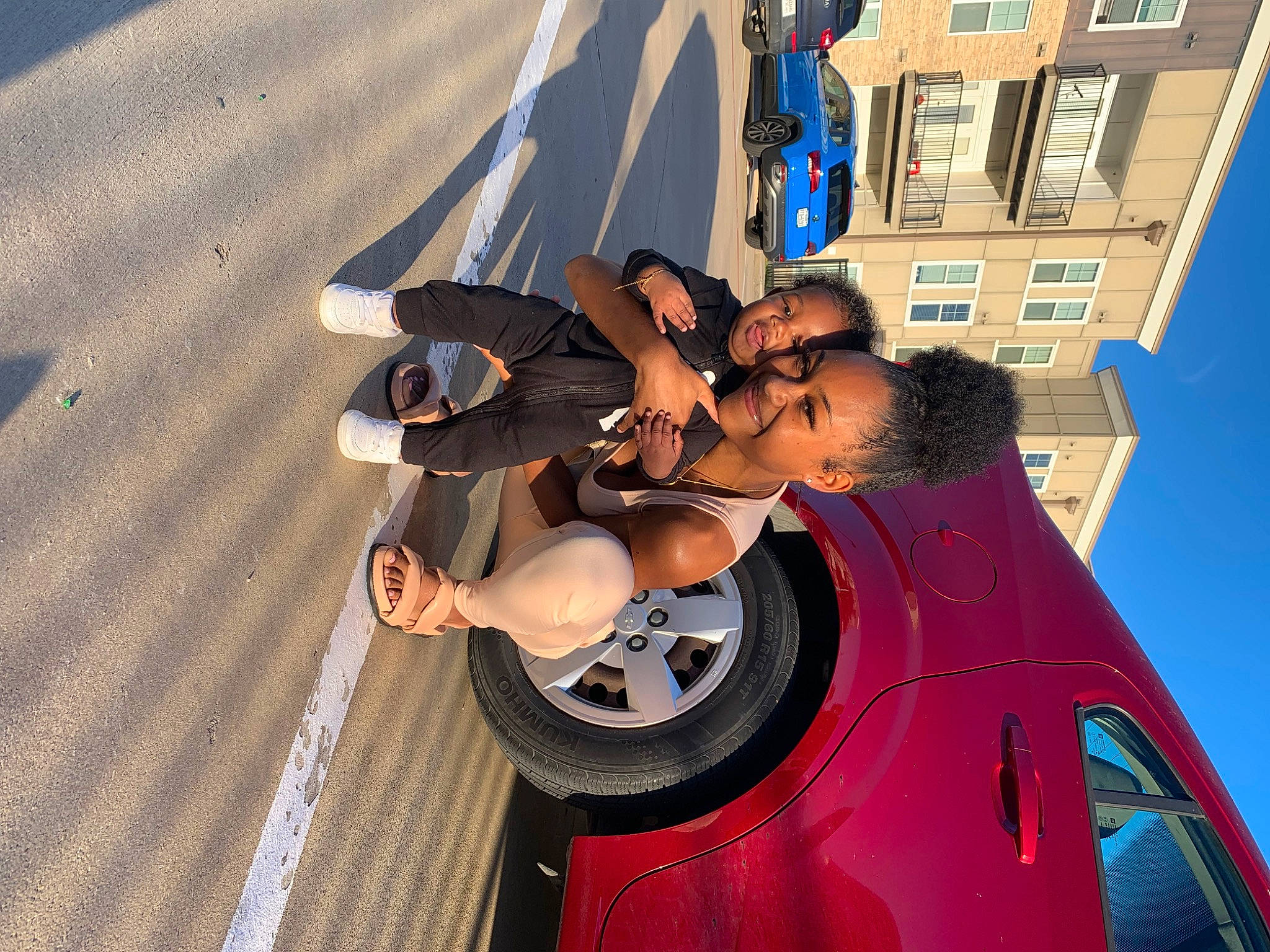 Saint Messiah is registered to the contest to win money with this photo: auto_part, automotive_design, automotive_exterior, automotive_lighting, automotive_tire, bumper, car, electric_blue, eyewear, fun, hat, hood, joy, leisure, motor_vehicle, person, rim, sunglasses, tire, vehicle_door