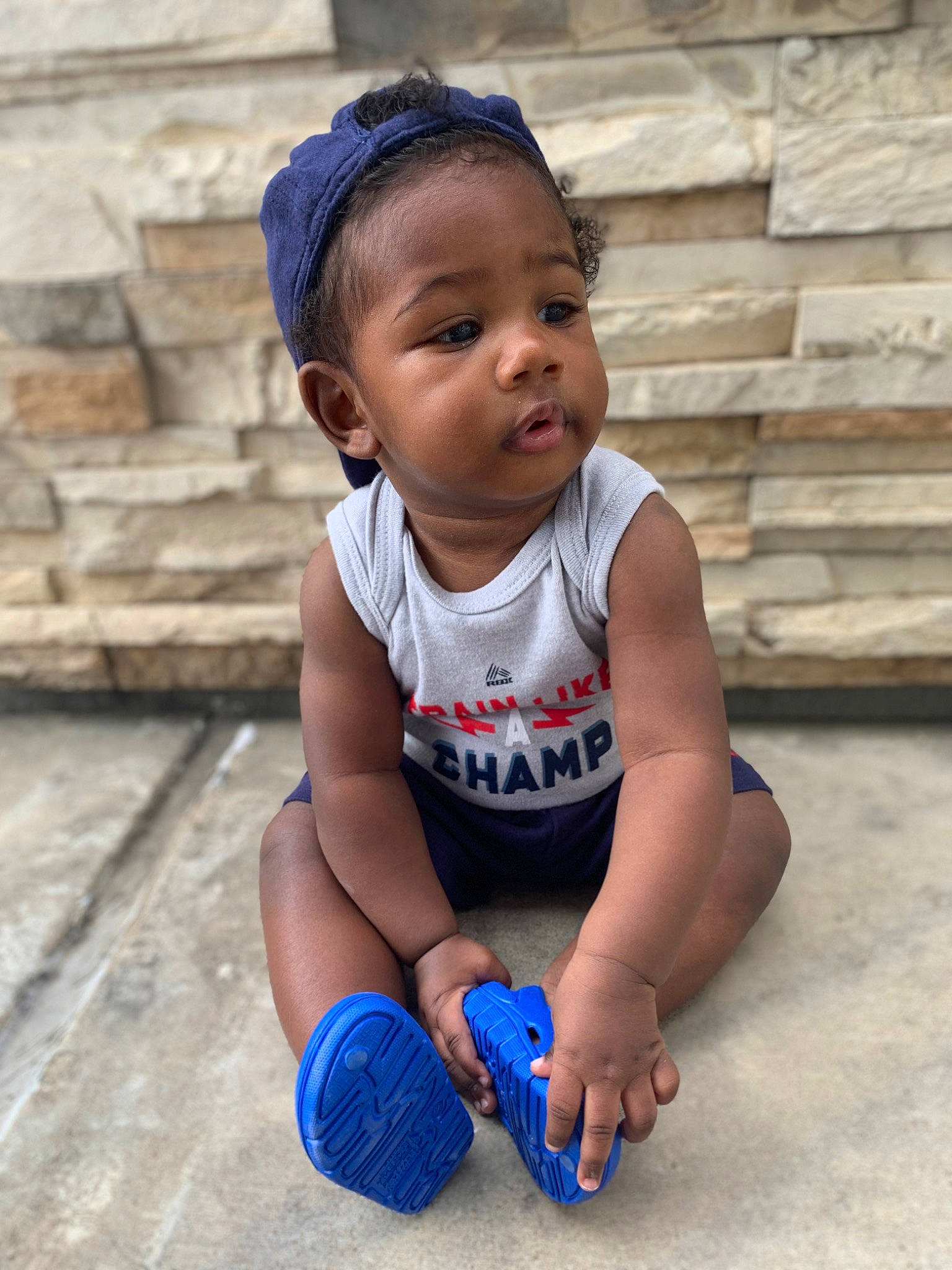 Saint Messiah is registered to the contest to win money with this photo: arm, azure, baby_toddler_clothing, child, eye, face, hair, happy, head, human_body, leg, person, photograph, skin, sleeve, smile, street_fashion, summer, t_shirt, temple