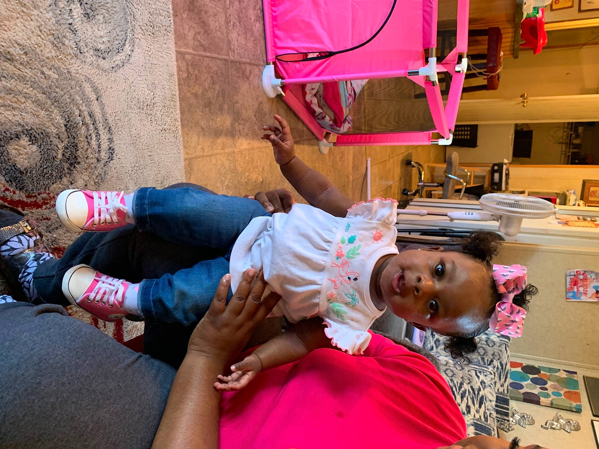 Lailonni is registered to the contest to win money with this photo: carmine, child, event, fun, happy, human_leg, knee, leisure, magenta, person, pink, red, sandal, shoe, shorts, sitting, sock, t_shirt, textile, thigh