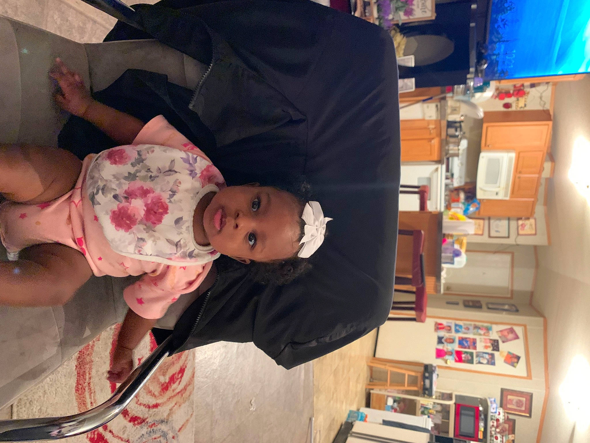 Lailonni is registered to the contest to win money with this photo: baby, baby_products, baby_toddler_clothing, bookcase, child, flesh, fun, happy, hat, person, room, t_shirt, toddler, vacation, visual_arts