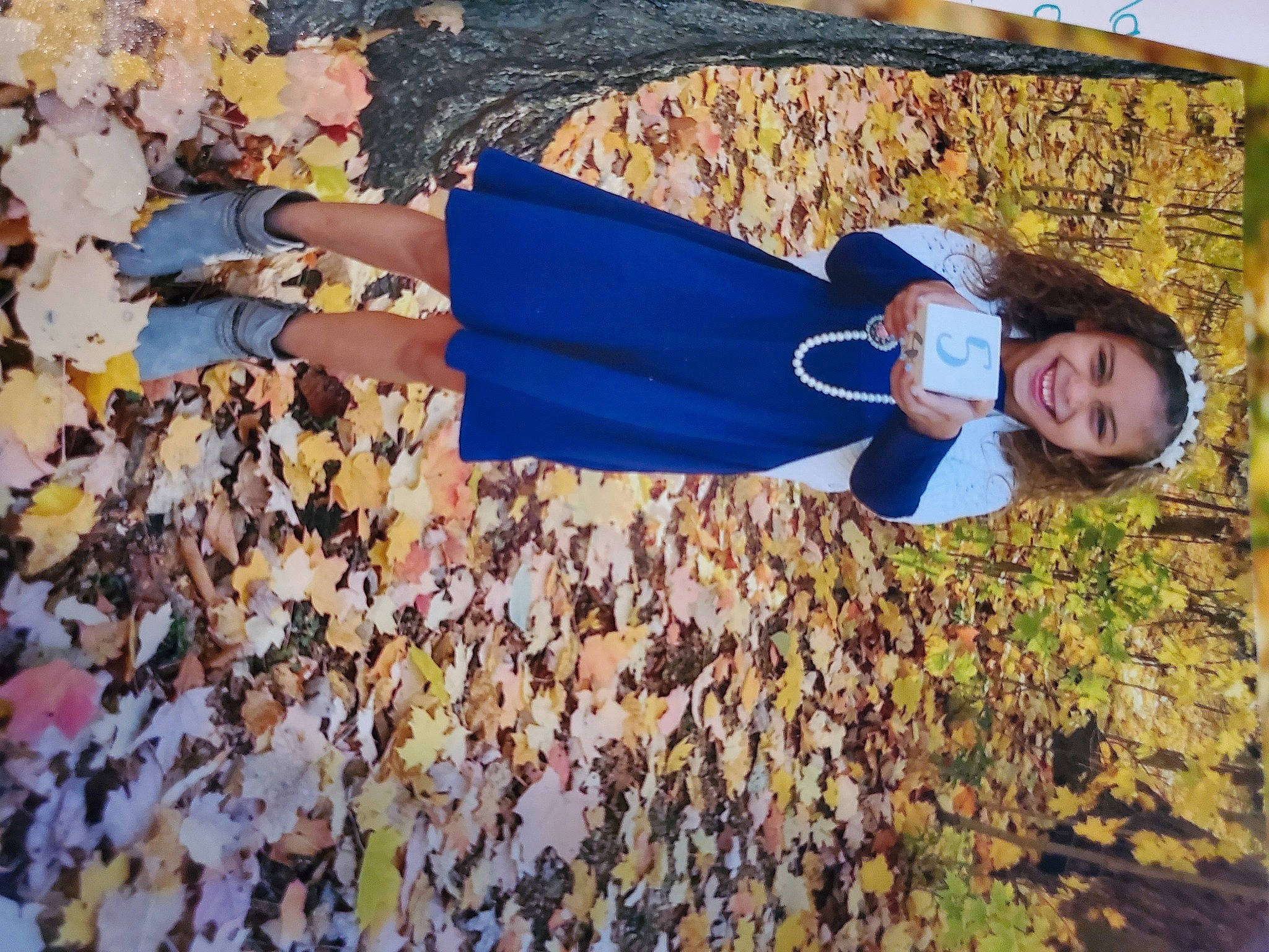 Maddie is registered to the contest to win money with this photo: branch, child, deciduous, electric_blue, fun, grass, happy, human_leg, joy, landscape, leaf, leisure, people_in_nature, person, shadow, smile, soil, spring, tints_and_shades, tree