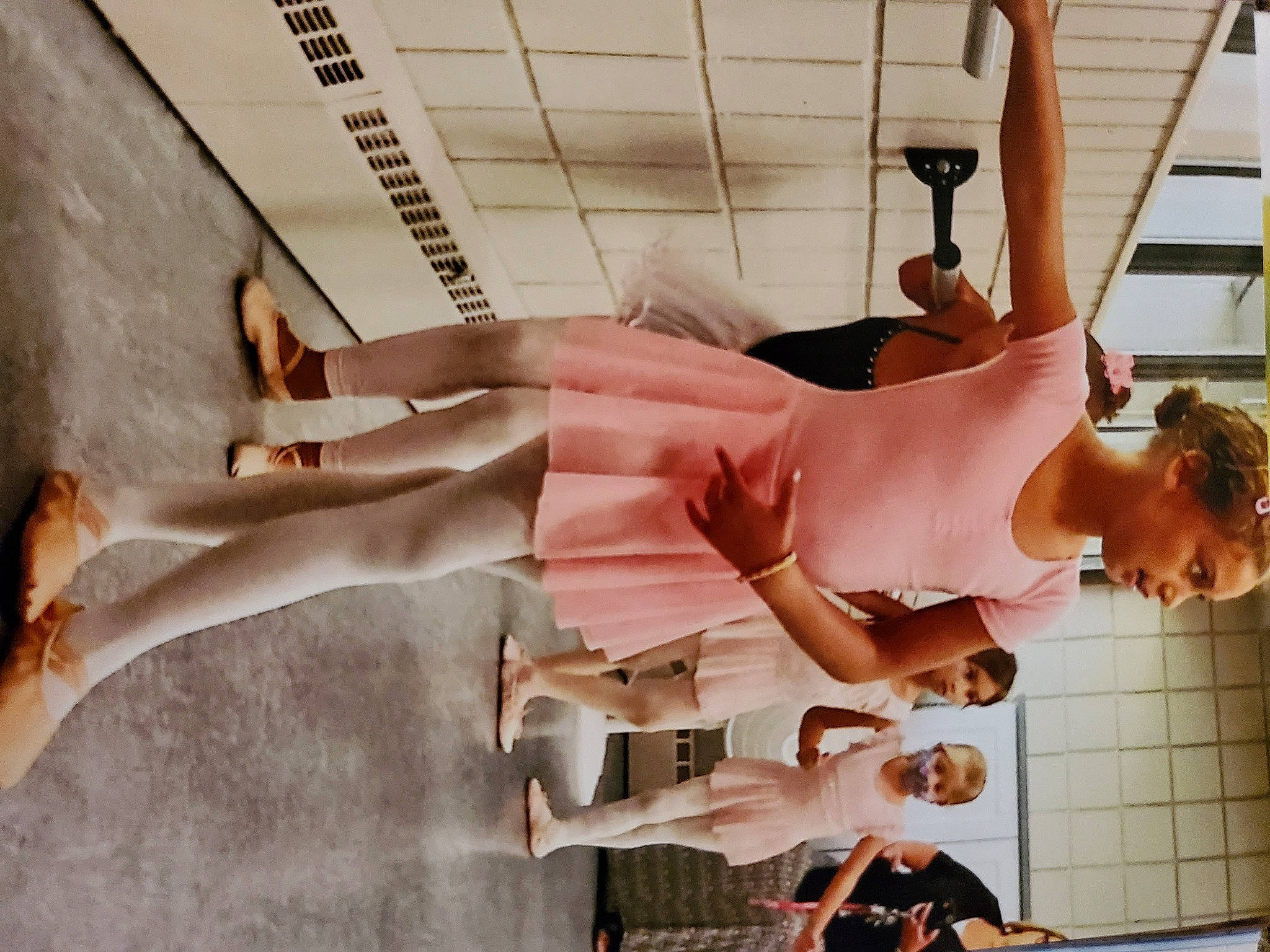 Maddie is registered to the contest to win money with this photo: arm, chest, cocktail_dress, dress, eyewear, fashion_design, foot, fun, high_heels, human_leg, knee, peach, person, room, sandal, shoulder, thigh, vacation, vintage_clothing, waist