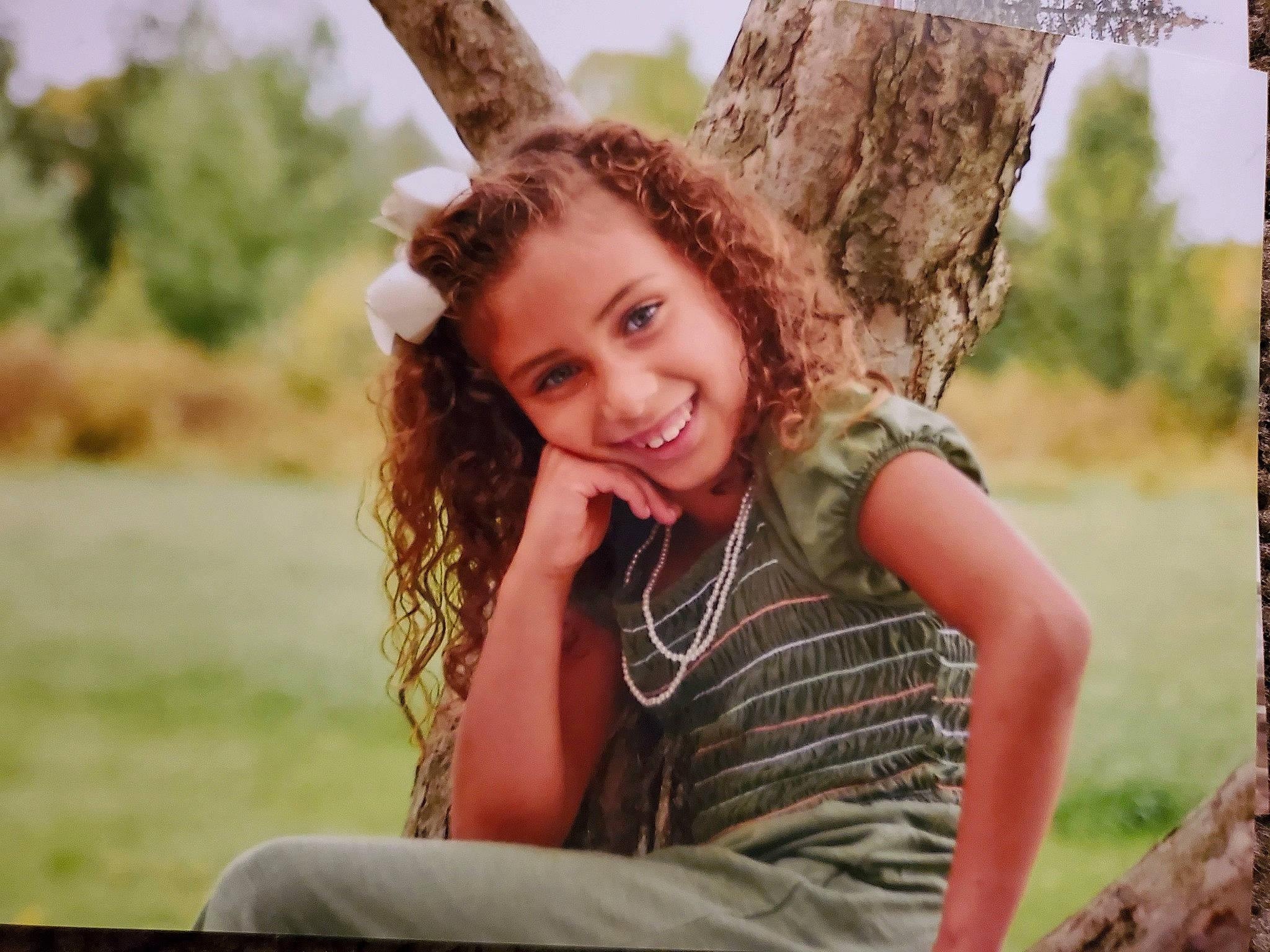 Maddie is registered to the contest to win money with this photo: beauty, blond, fawn, flash_photography, fun, grass, grass_family, grassland, happy, joy, leisure, long_hair, people_in_nature, person, plant, skin, smile, summer, sunlight, tree