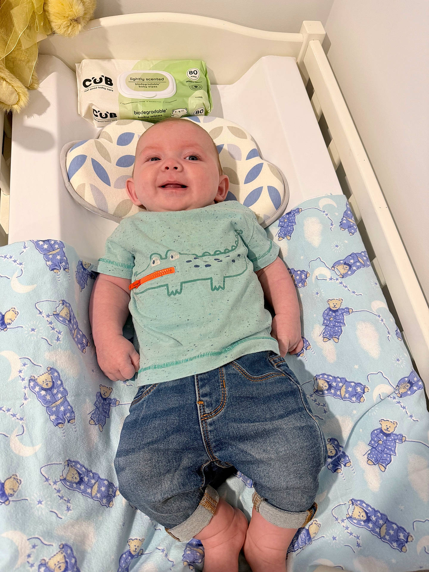 Kolby joined the competition — help win amazing prizes! baby, bed, clothing, cradle, crib, cushion, face, furniture, head, homedecor, indoors, infantbed, jeans, newborn, pants, person, photography, portrait, shorts, standing