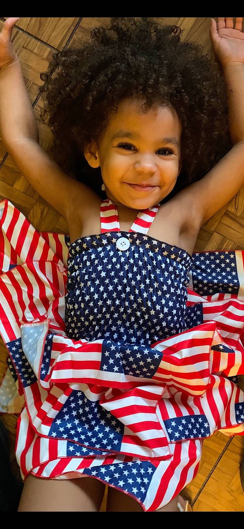 Olivia joined the competition — help win amazing prizes! baby_toddler_clothing, cheek, child, event, flag, flag_day_usa, flag_of_the_united_states, fun, happy, joy, leisure, pattern, people, person, polka_dot, portrait_photography, red, sitting, sleeve, smile