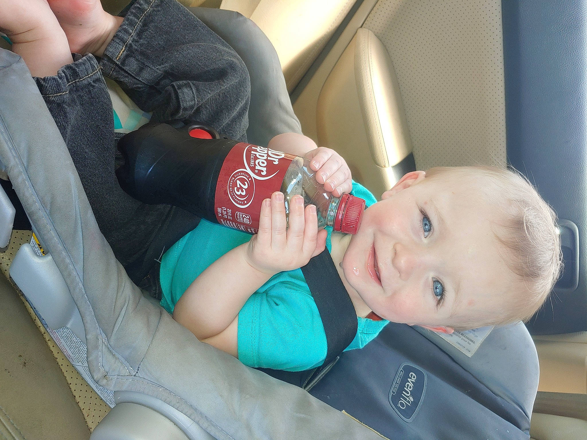 Kai is registered to the contest to win money with this photo: arm, baby, car_seat, child, elbow, finger, hand, joy, nail, person, toddler