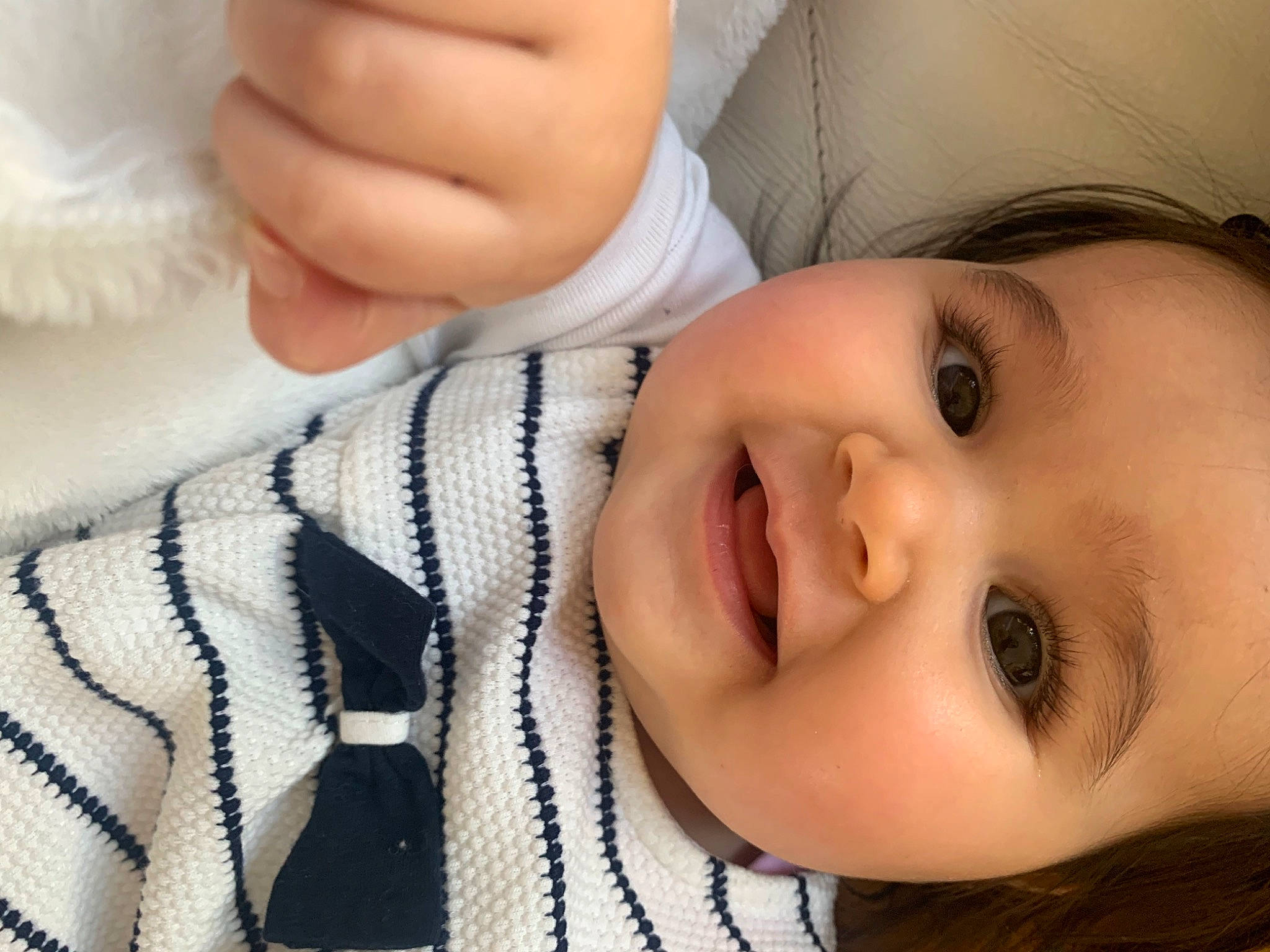 Isabella a rejoint le concours — aidez-le/la à gagner de superbes lots ! baby, cheek, chin, comfort, eye, eyelash, face, finger, gesture, happy, headwear, iris, lip, mammal, mouth, nose, person, plant, skin, smile