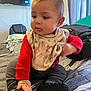 Javier is registered to the contest to win money with this photo: accessories, baby, bodypart, clothing, computerhardware, couch, electronics, face, finger, furniture, hand, hardware, head, monitor, pants, person, photography, portrait, screen, sitting