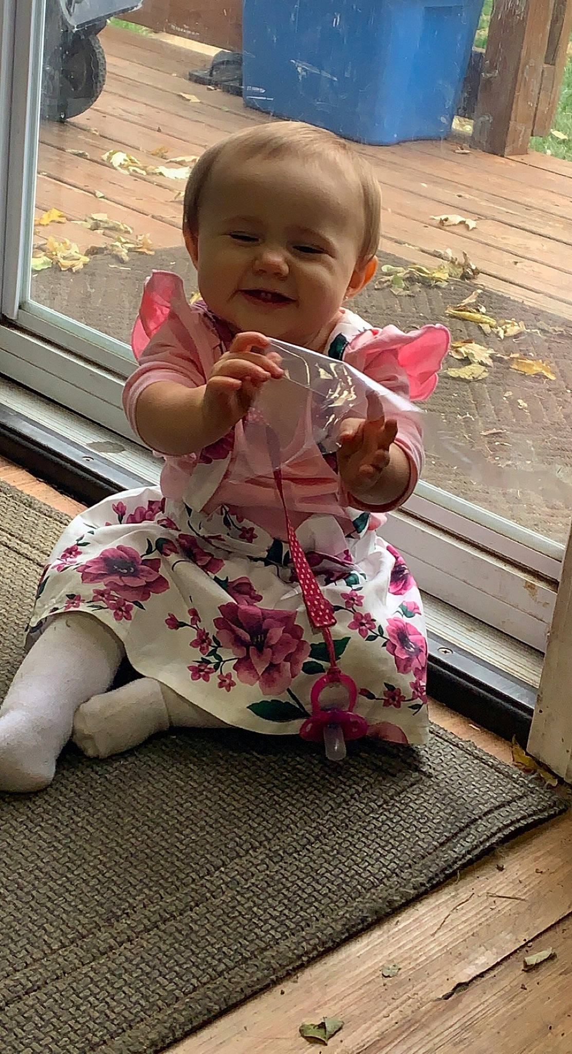 Sadie is registered to the contest to win money with this photo: baby, baby_toddler_clothing, cheek, chin, dress, eye, face, hair, hairstyle, head, human_body, iris, leg, lip, mouth, person, pink, skin, sleeve, smile