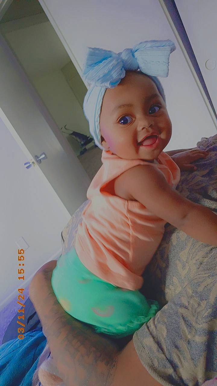 Aviana joined the competition — help win amazing prizes! arm, baby, blue, cheek, eye, finger, head, headgear, human_body, knee, mouth, person, pink, shoulder, skin, smile, stomach, thigh, toddler, trunk