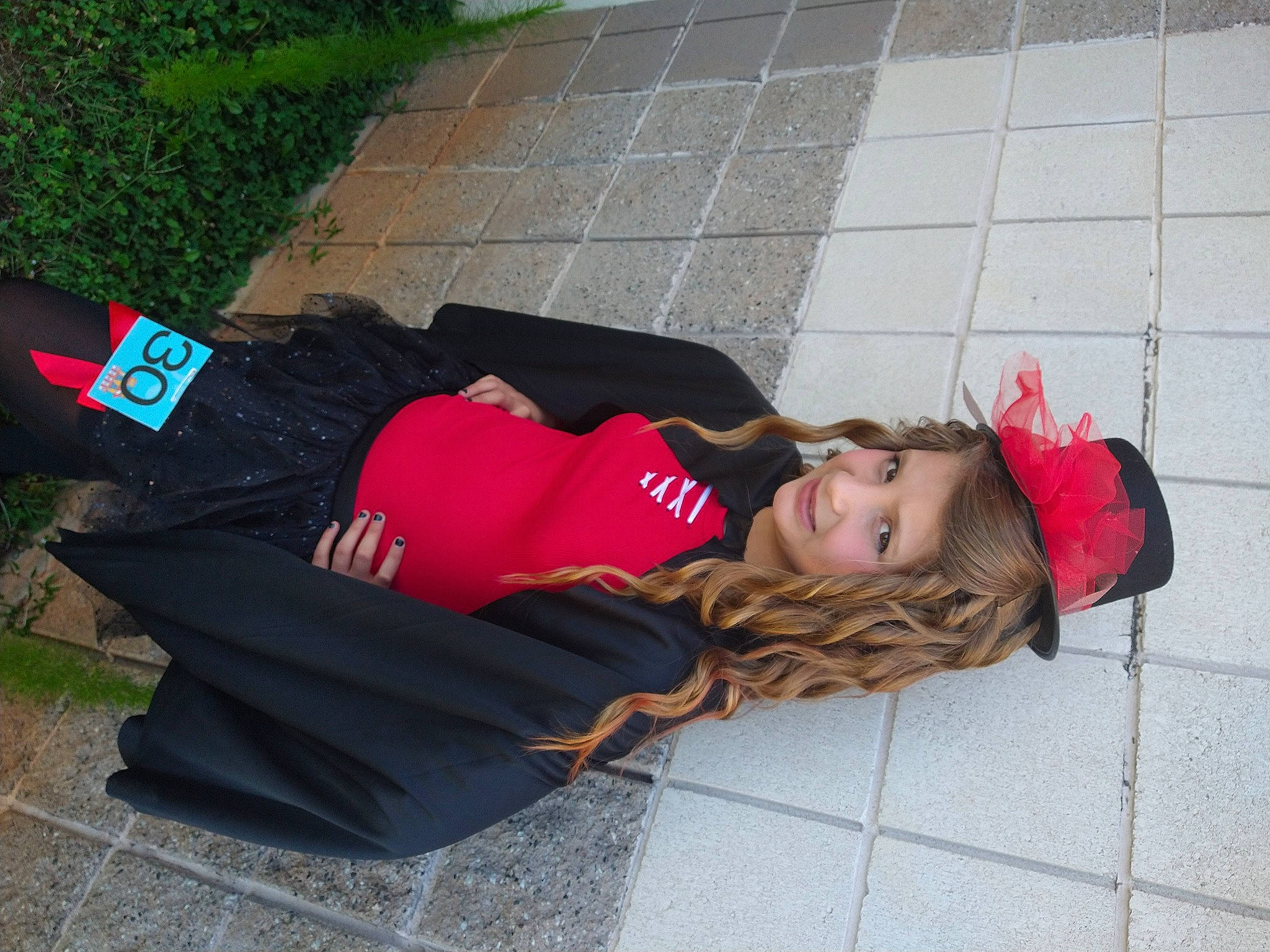 Alyssa joined the competition — help win amazing prizes! active_pants, carmine, comfort, grass, joy, nap, person, road_surface, sidewalk, sitting, thigh