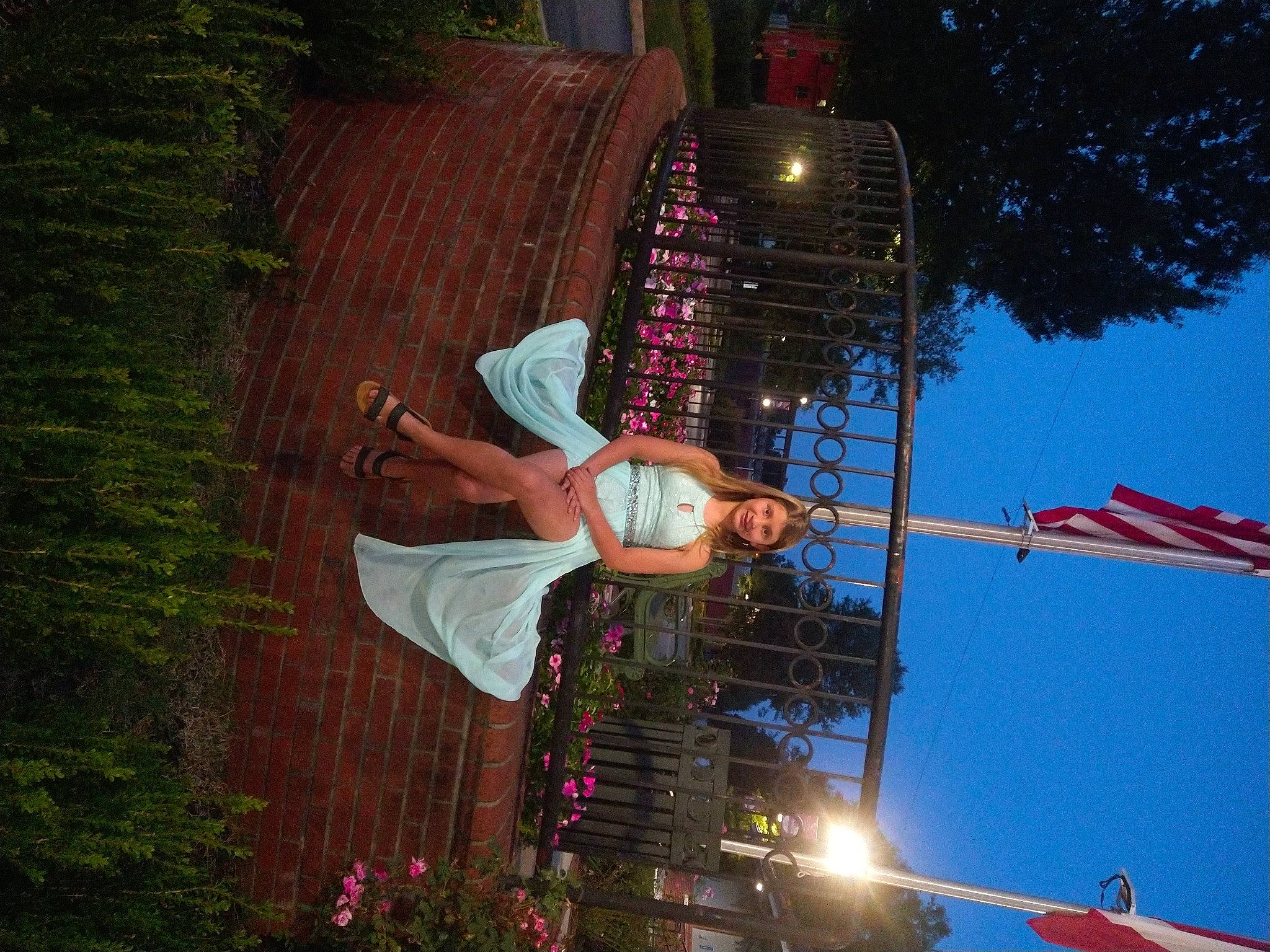 Alyssa joined the competition — help win amazing prizes! electrical_supply, electricity, event, flag, fun, hat, joy, landscape, leisure, light, night, palm_tree, person, plant, pole, public_utility, sky, smile, street_light, summer