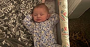 Lyric joined the competition — help win amazing prizes! baby, sleeping, onesie, doll, blanket, playpen, toy, infant, cozy, child, sleep, bedtime, soft, comfort, patterned_blanket, head, face, indoor, peaceful, resting