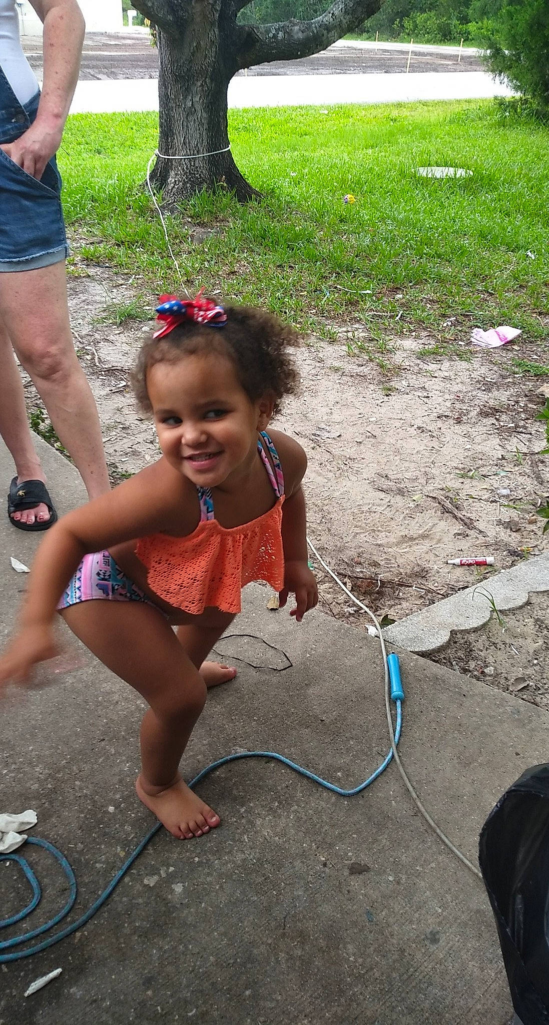 Tina is registered to the contest to win money with this photo: child, fun, hula_hoop, joy, person, play, smile, summer, toddler, toy, vacation