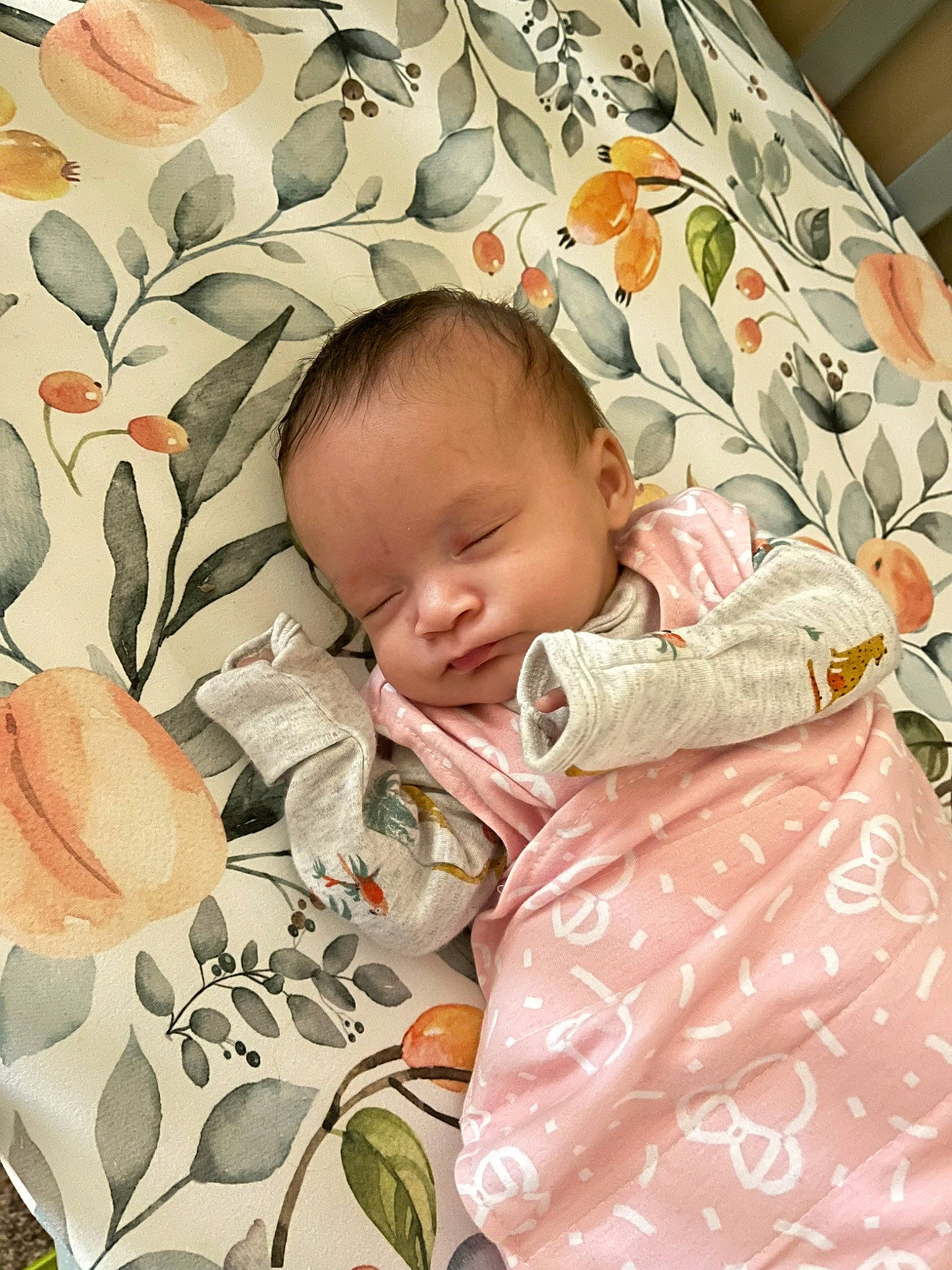 London is registered to the contest to win money with this photo: baby, baby_products, baby_sleeping, baby_toddler_clothing, bedding, bedtime, cheek, child, comfort, face, head, linens, pattern, people, person, petal, pink, product, sleeve, textile