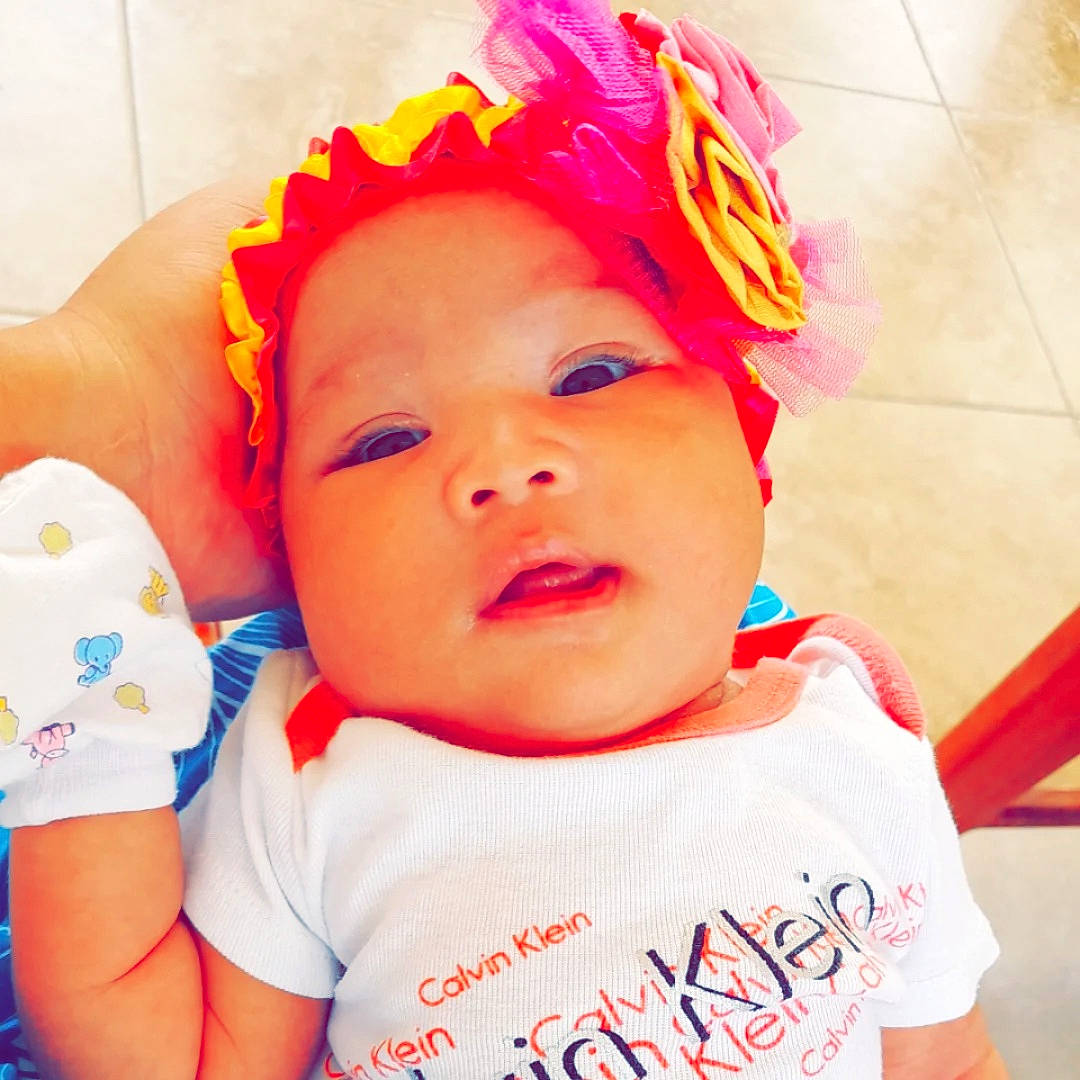 Mereteata participe au concours pour gagner de l'argent avec cette photo : baby, baby_toddler_clothing, cap, cheek, chin, cool, eye, eyebrow, face, happy, head, headwear, iris, lip, mouth, nose, person, pink, skin, sleeve