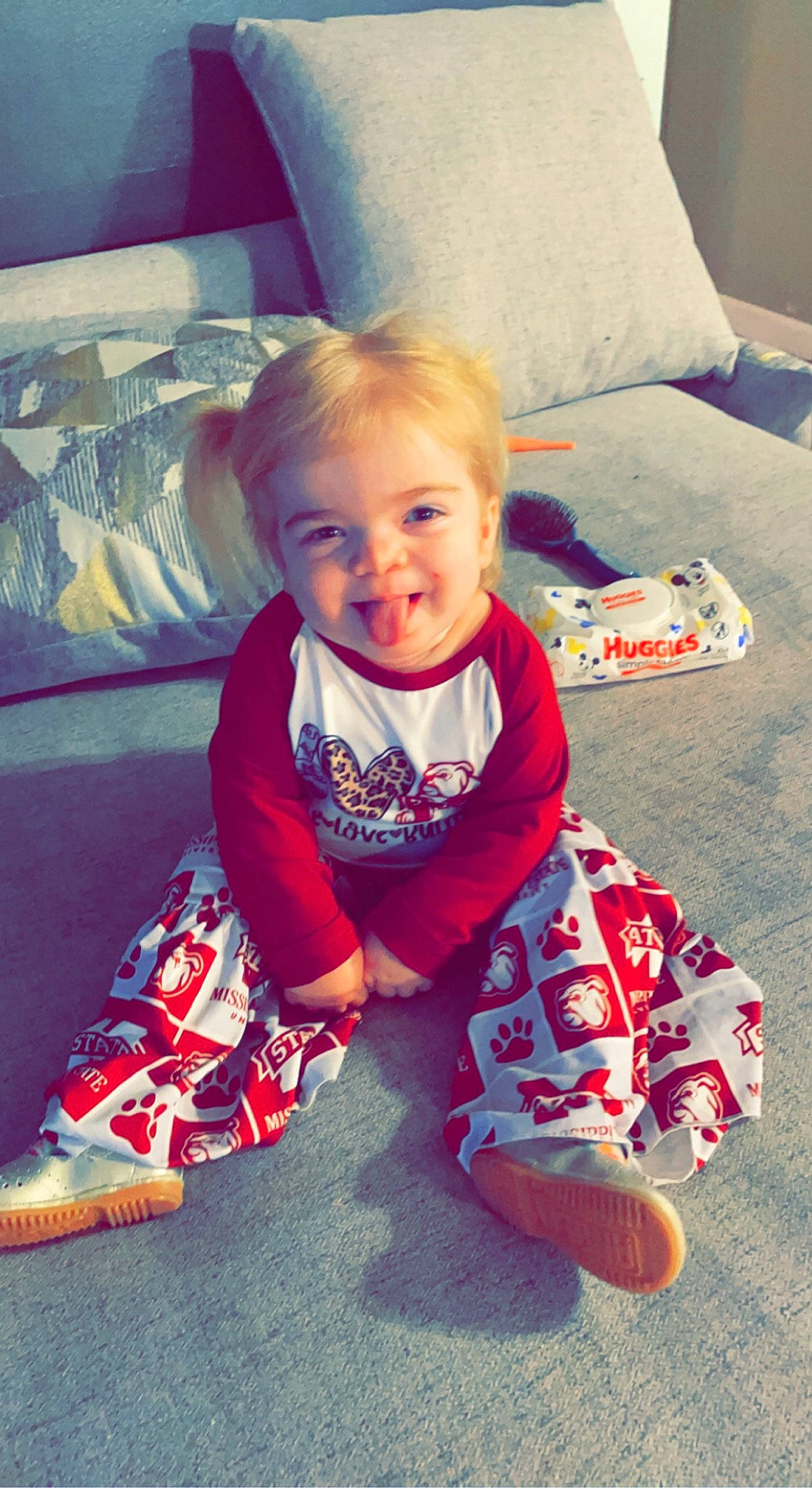 Everly joined the competition — help win amazing prizes! baby, baby_toddler_clothing, child, comfort, cool, eye, floor, flooring, fun, happy, human_leg, magenta, pattern, person, room, sitting, sleeve, smile, t_shirt, textile