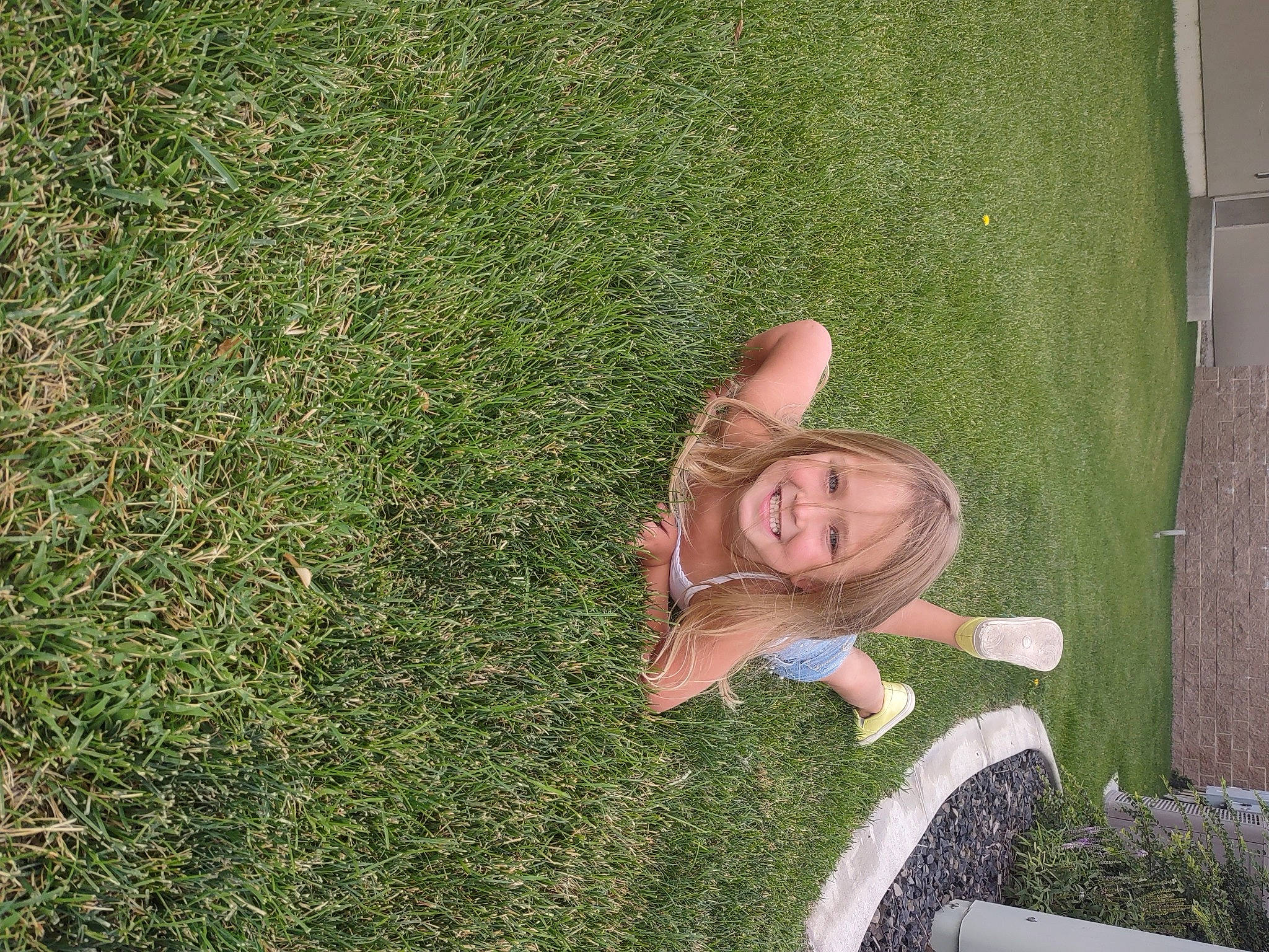 Brynnley joined the competition — help win amazing prizes! artificial_turf, flooring, fun, garden, grass, grass_family, grassland, happy, joy, lawn, leisure, mammal, people_in_nature, person, plant, recreation, shrub, sitting, smile, soil