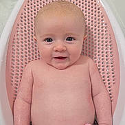 Felicity is registered to the contest to win money with this photo: baby, infant, bath, bathroom, pink, toy, elephant_toy, water, seat, child, skin, cute, smiling, happy, toddler, playful, sitting, face, head, arm