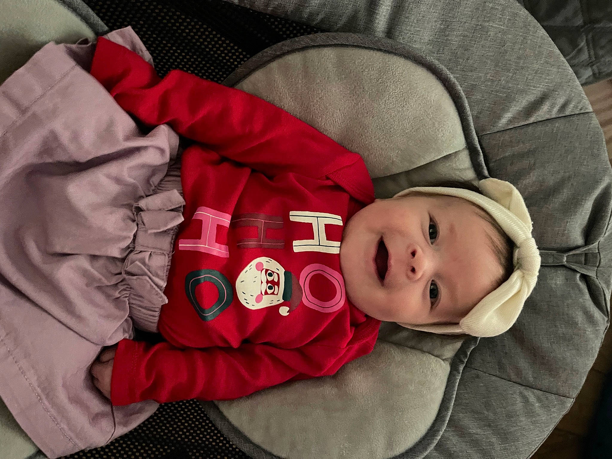 Amayah is registered to the contest to win money with this photo: baby, baby_carriage, baby_products, baby_toddler_clothing, carmine, cheek, child, comfort, face, hat, headgear, headwear, magenta, outerwear, person, product, sitting, sleeve, smile, toddler