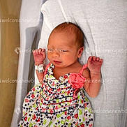 Zariah joined the competition — help win amazing prizes! baby, bassinet, child, cute, floral_dress, hospital, hospital_bed, indoors, infant, medical, newborn, newborn_photo, peaceful, person, portrait, sleeping, small_hands, watermark, white_sheet, wristband