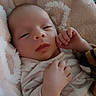 Zariah is registered to the contest to win money with this photo: baby, newborn, infant, blanket, soft, cozy, sleepy, cute, face, hand, skin, clothing, portrait, closeup, indoors, child, resting, comfort, warm, toddler