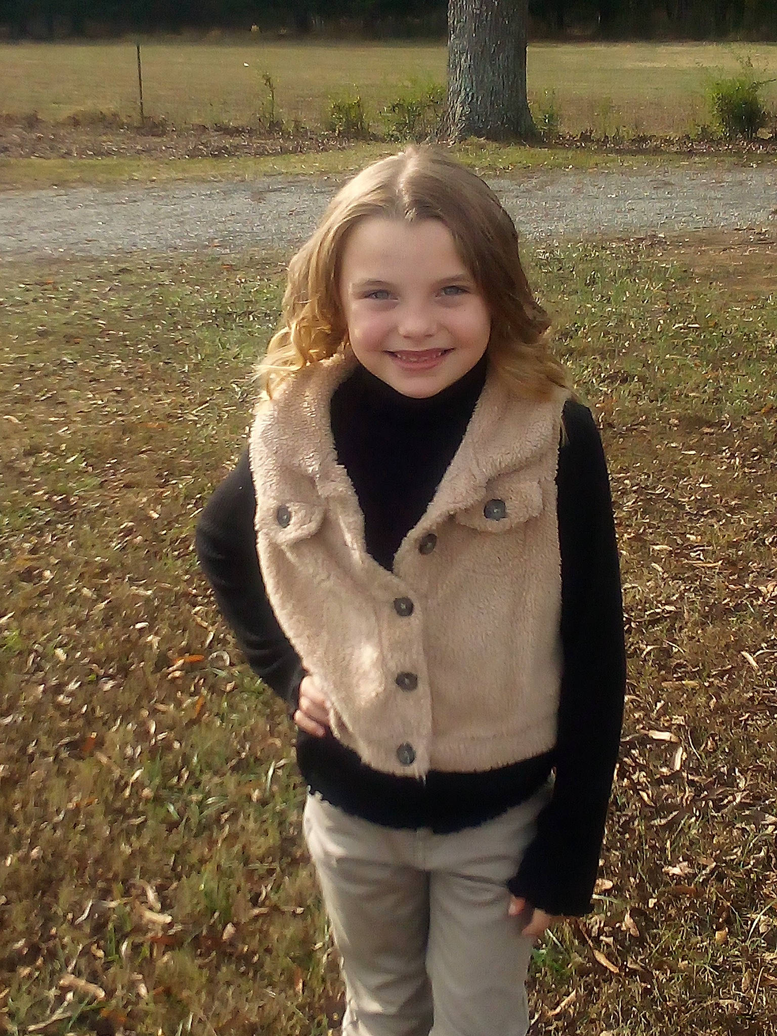 Aleah is registered to the contest to win money with this photo: blond, brown_hair, flash_photography, fur, grass, grassland, happy, jewellery, joy, lip, long_hair, outerwear, pattern, people_in_nature, person, sitting, sleeve, smile, soil, tree