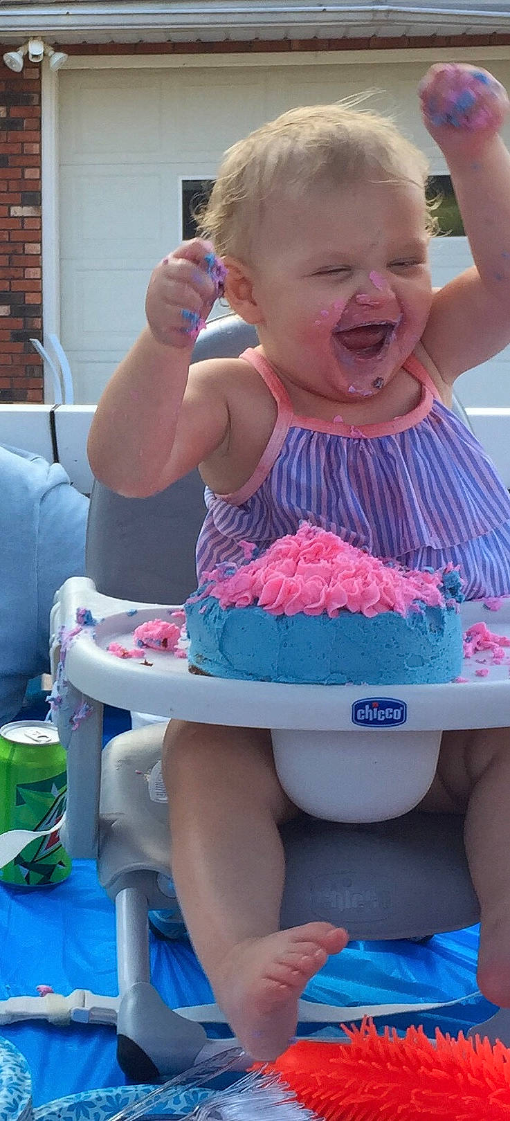 Flora is registered to the contest to win money with this photo: baby, baby_toddler_clothing, blue, brickwork, child, cooking, electric_blue, food, fun, green, hairstyle, happy, leisure, magenta, person, pink, recreation, shoulder, smile, summer