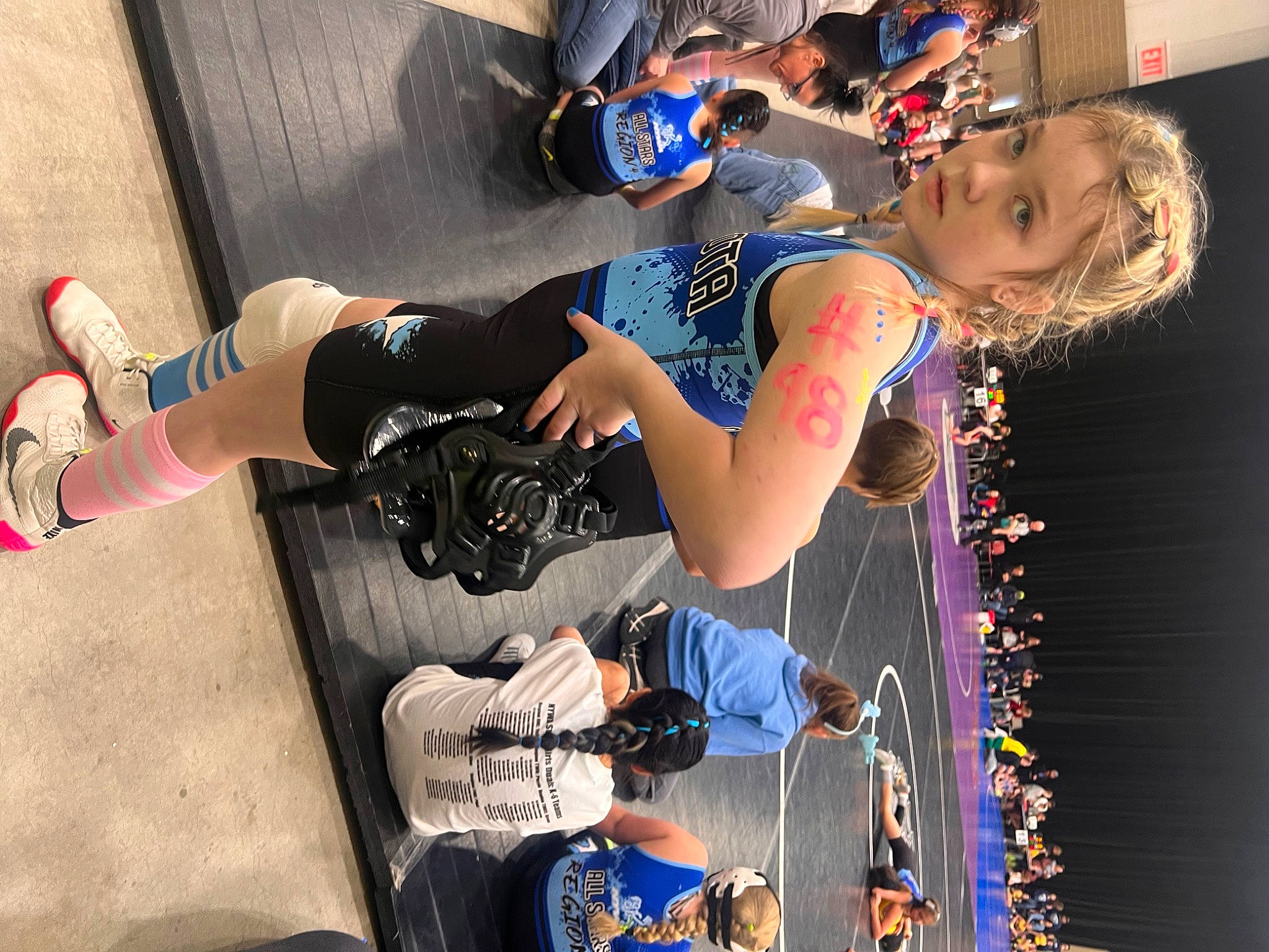 Makaylah is registered to the contest to win money with this photo: blue, entertainment, event, eyewear, fun, guitar, human_leg, jewellery, leisure, luggage_and_bags, music, musical_instrument, musician, performing_arts, person, public_event, recreation, shorts, sunglasses, t_shirt